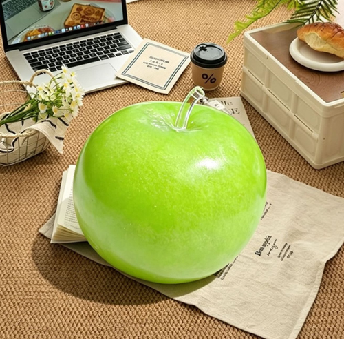 Large bright green apple squishy toy
