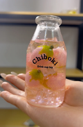 Pink glitter fruit drink bottle squishy toy